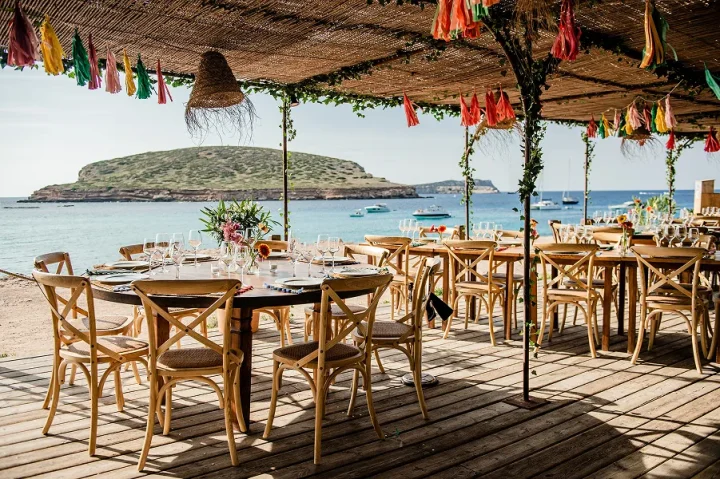 Stylish seaside venue setup in Ibiza for corporate events, enhanced with professional hostess service by Balearic Elements